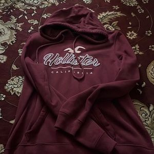 Burgundy hollister hoodie in the size large. Also really soft in the inside!